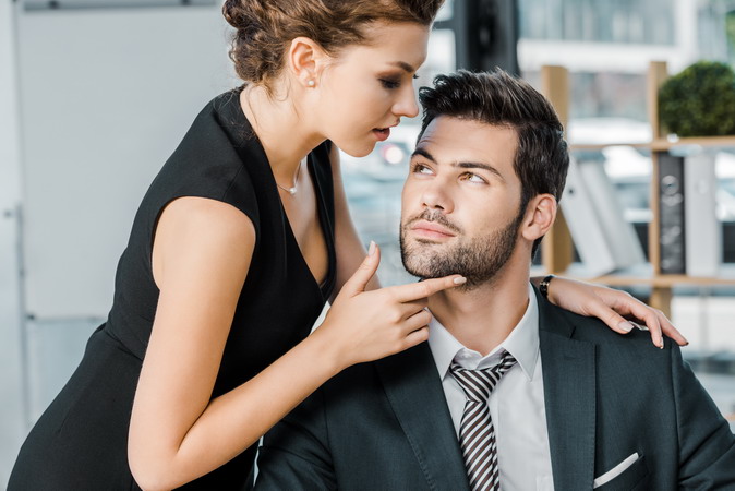 Erotic workplace role-play between adults