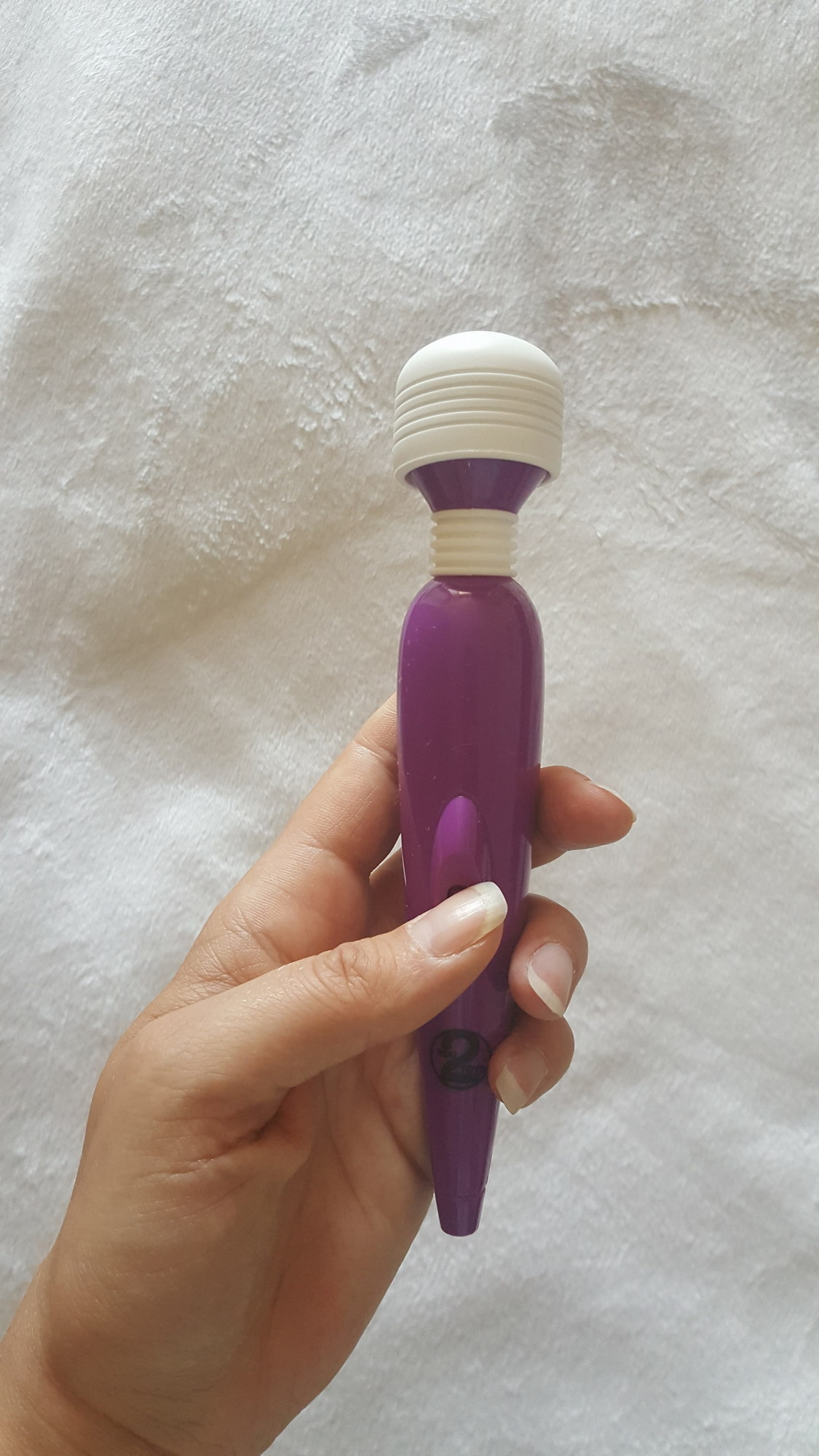 Women's Spa Mini Massager with a flexible, grooved massage head